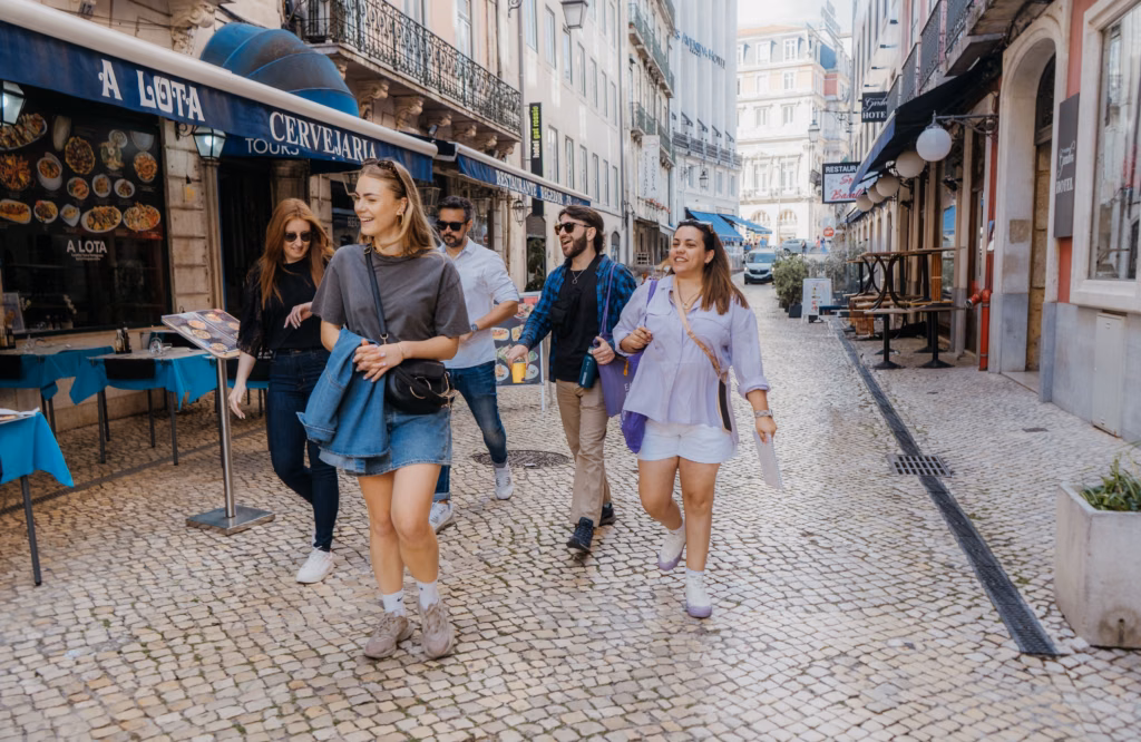 Guests walking around in Lisbon's downtown.