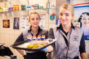 two_ladies_working_in_a_restaurant_on_eating_europe_food_tour