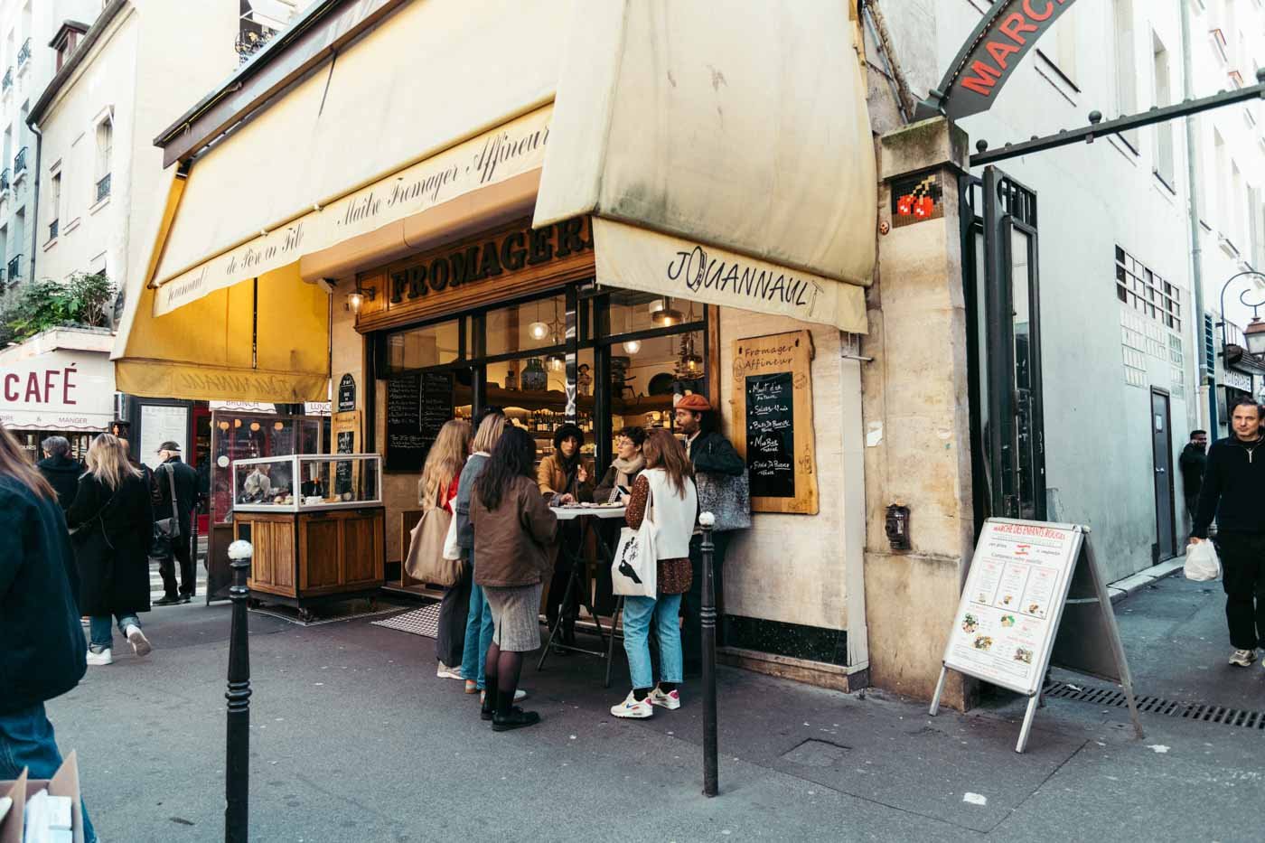 tour_group_standing_outside_Fromagerie_Jouannault_Paris